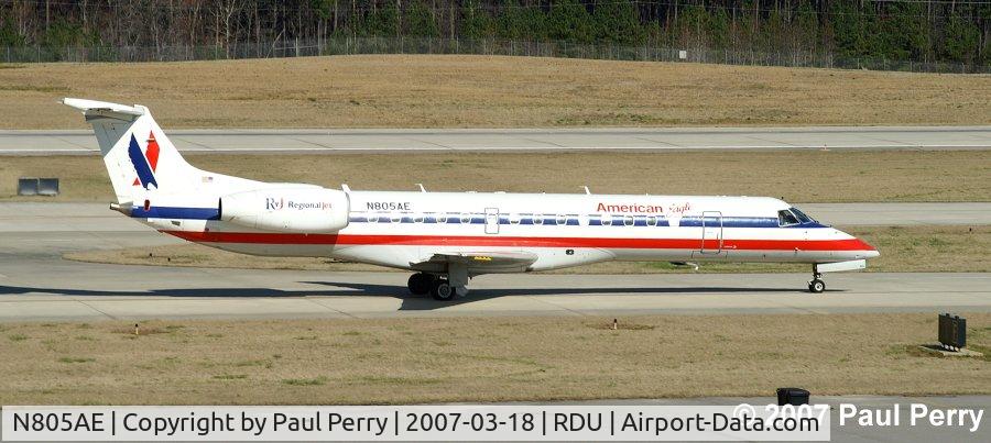 N805AE, 2001 Embraer ERJ-140LR (EMB-135KL) C/N 145489, Taxiing down to the end of Runway 23R