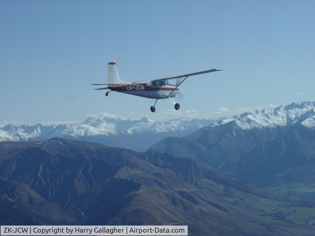ZK-JCW, 1979 Cessna 180K Skywagon C/N 18053100, ZK-JCW cruising in the Southern Alps of NZ