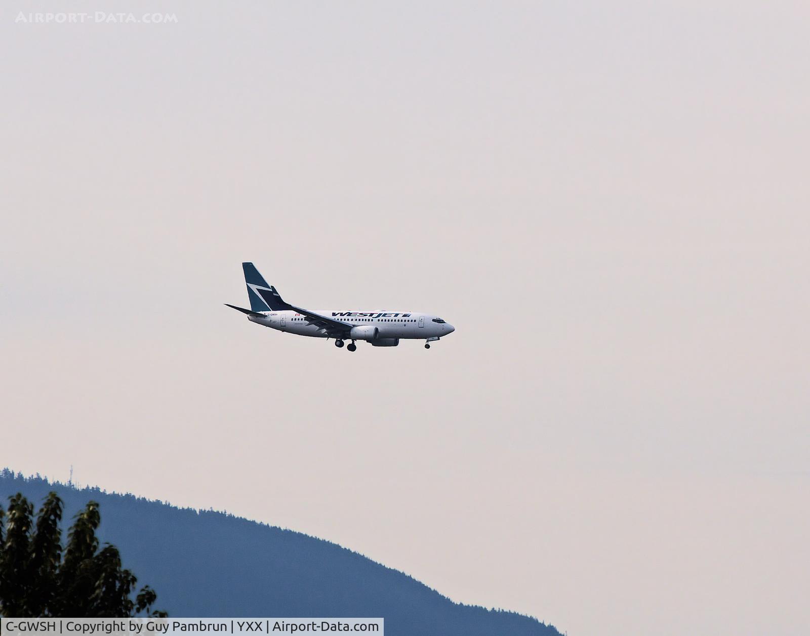 C-GWSH, 2002 Boeing 737-76N C/N 29886, On short final into YXX on a smoggy day