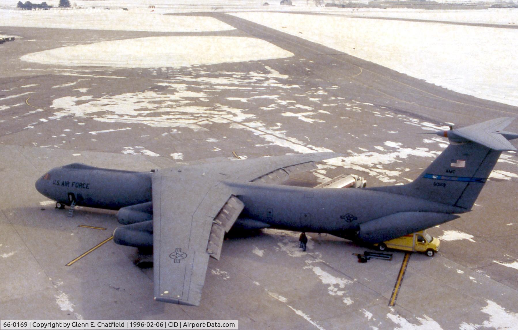 66-0169, 1966 Lockheed C-141B-LM Starlifter C/N 300-6195, C-141B at the base of the control tower - hot film made brown haze