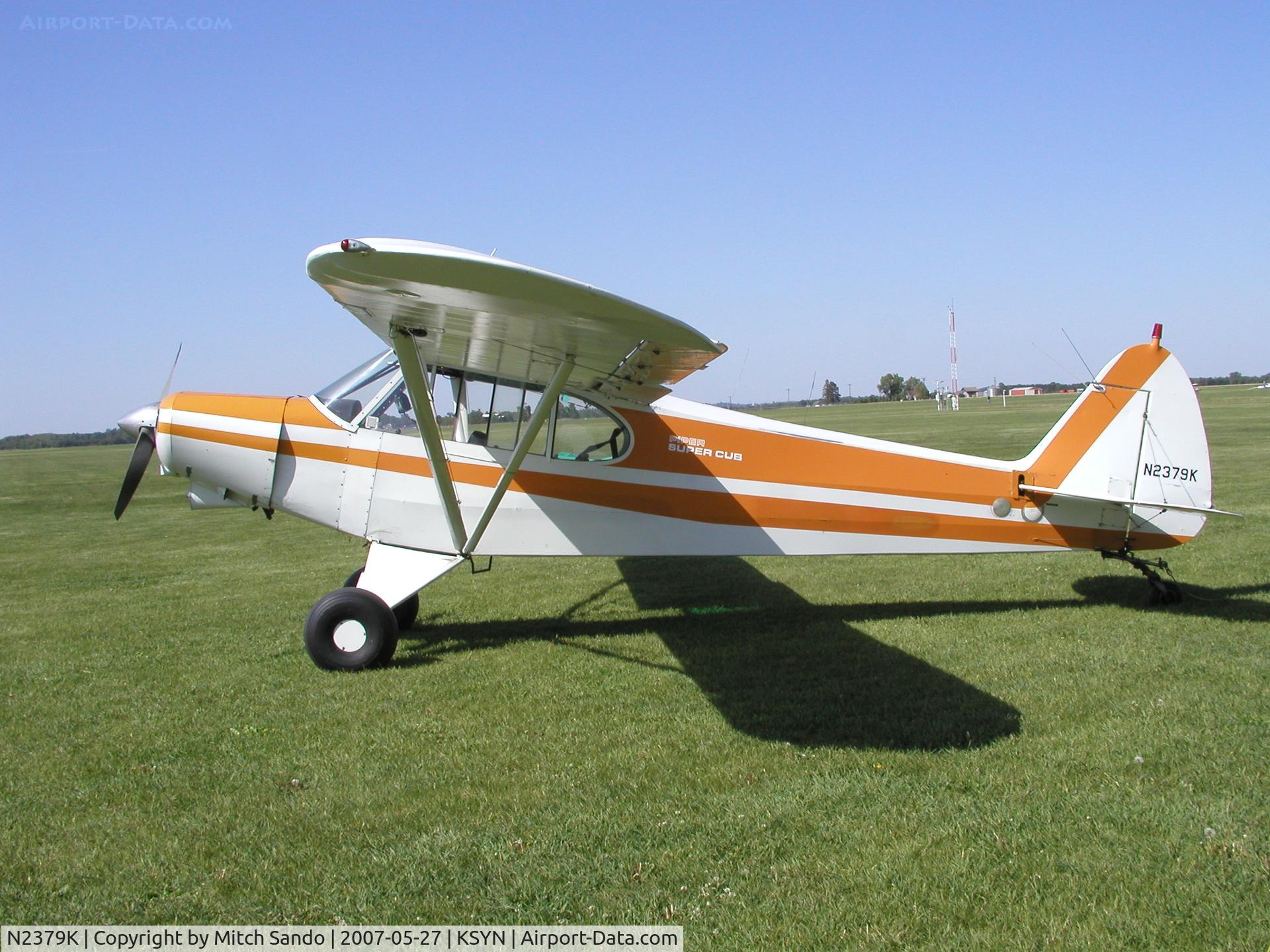 N2379K, 1979 Piper PA-18-150 Super Cub C/N 18-8009054, Super Cub with a tow line attached.