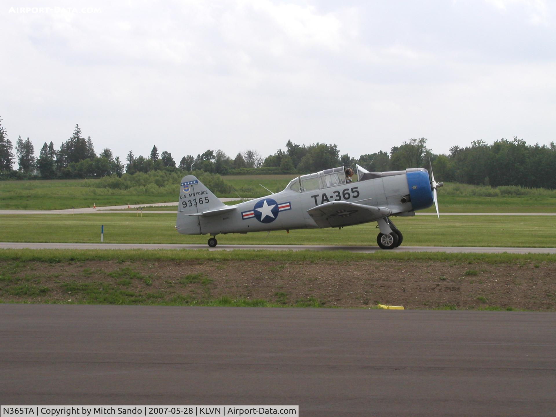 N365TA, 1951 North American T-6G Texan C/N 168-479, Taxiing out for a fly-over at the Memorial Day Open House at Airlake.