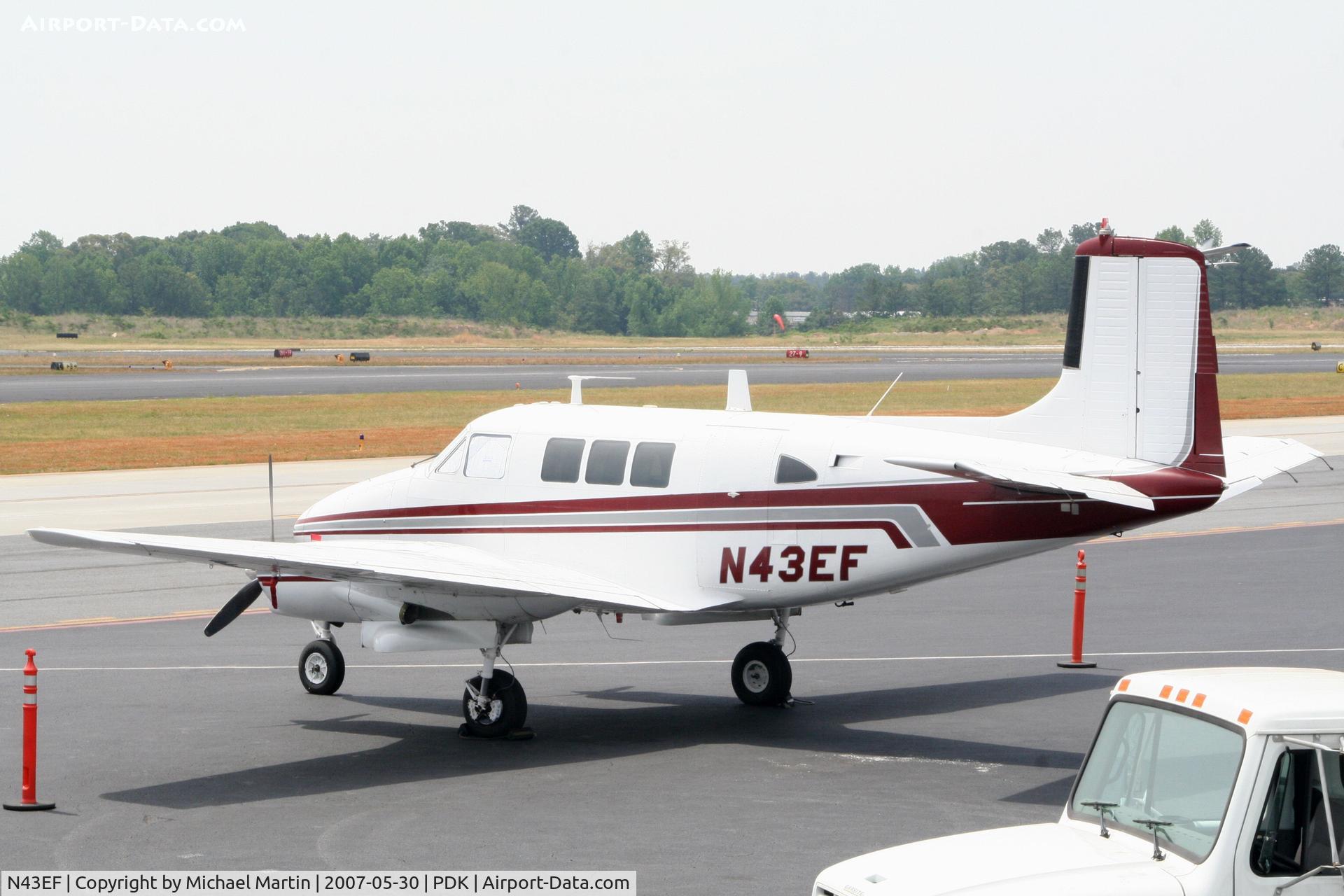 N43EF, Beech 65 (LF-23F) C/N LF-48, Tied down @ Mercury Air Center
