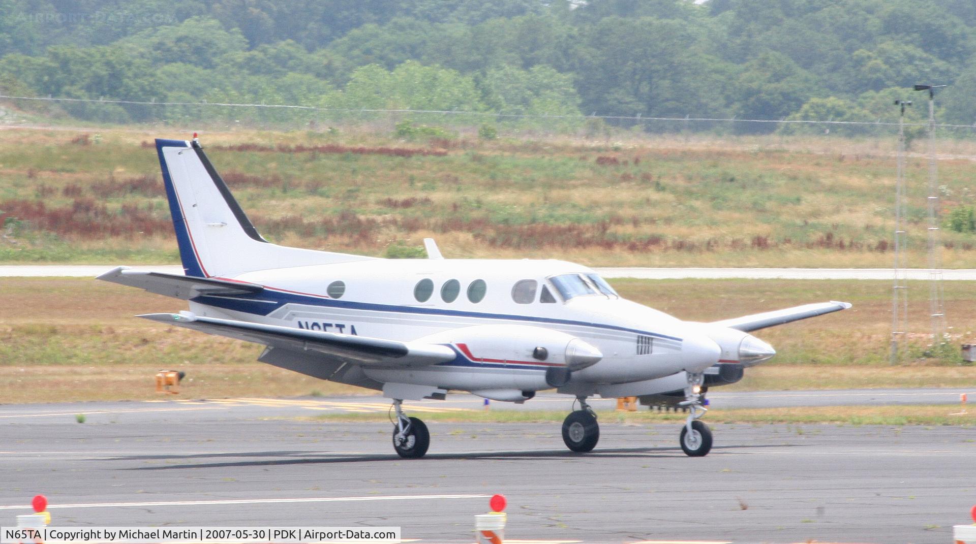 N65TA, 1971 Beech C90 King Air C/N LJ-538, Taxing to Epps Air Service