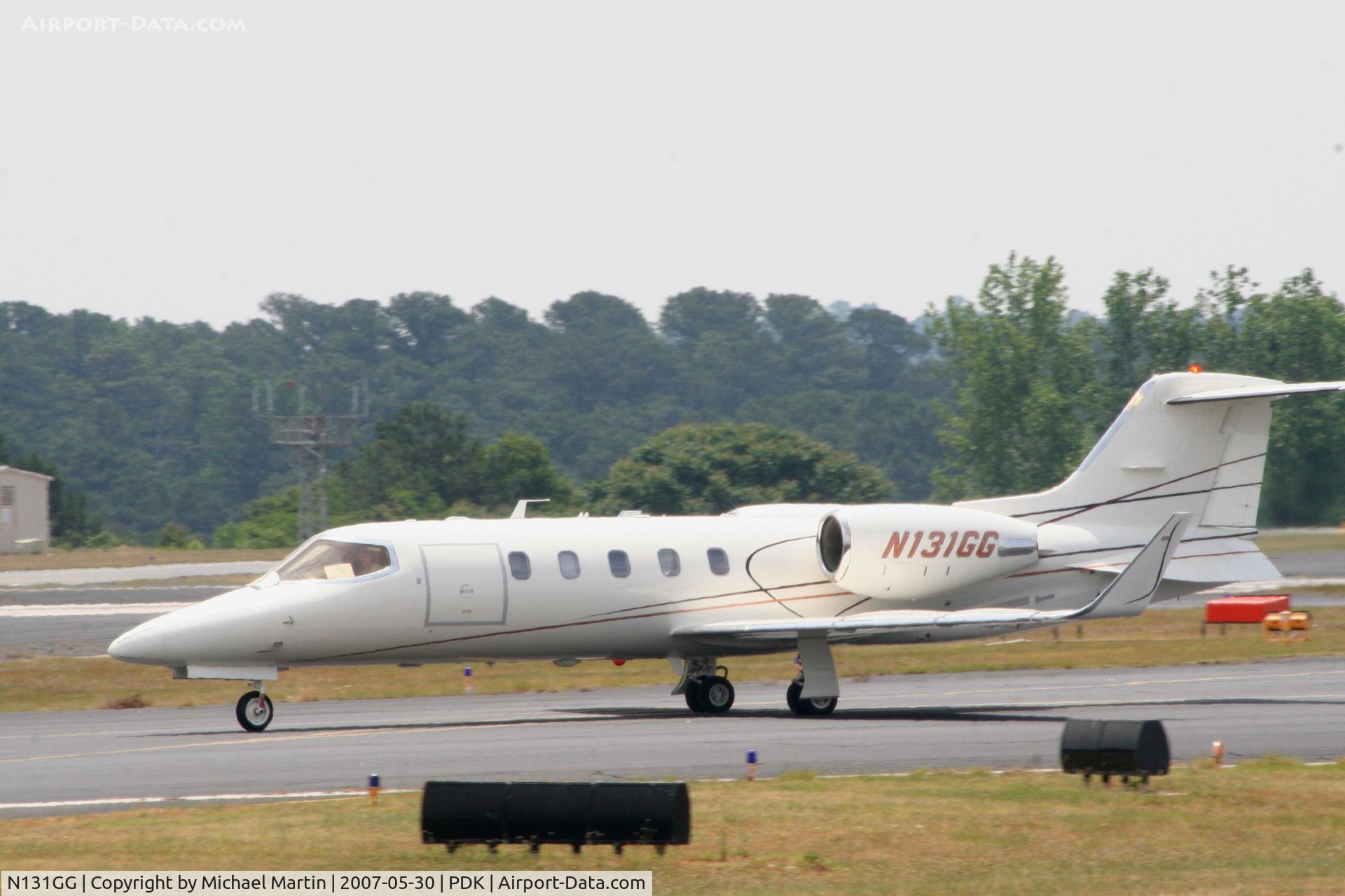 N131GG, 1995 Learjet Inc 31A C/N 113, Back Taxing On Runway 2L