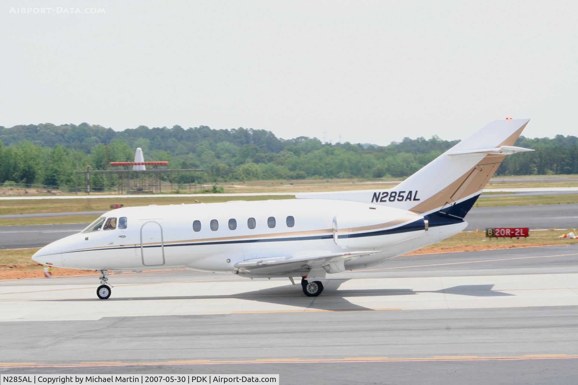 N285AL, 1987 British Aerospace BAe.125 Series 800A C/N 258085, Taxing past on going construction