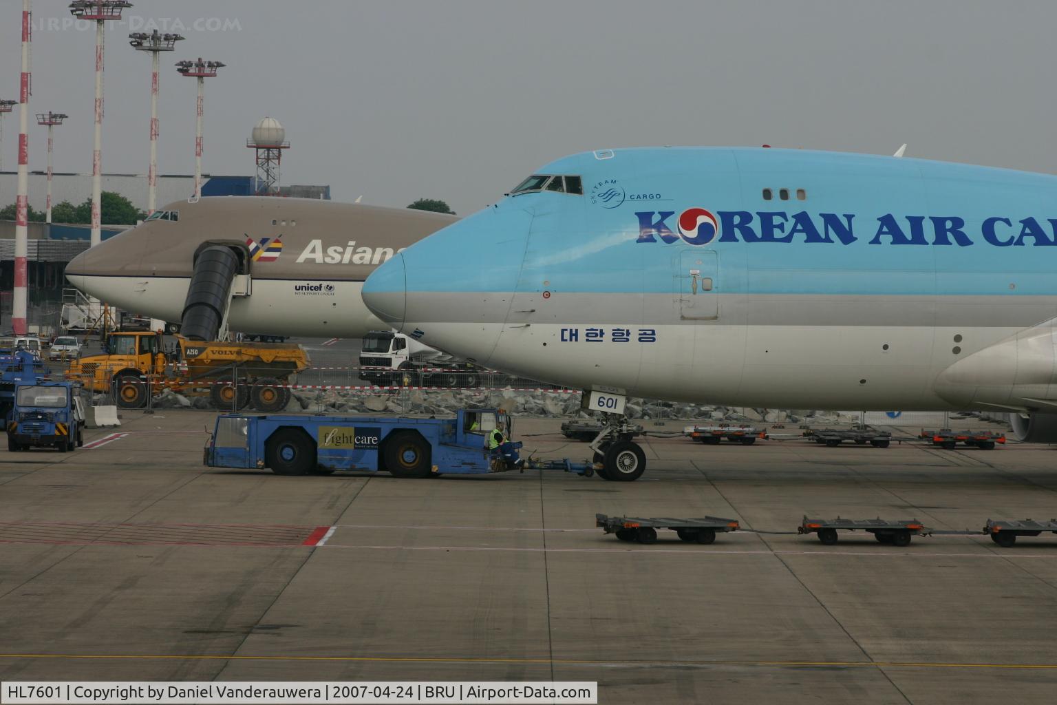 HL7601, 2004 Boeing 747-4B5F/SCD C/N 33949, pushed-back to leave apron