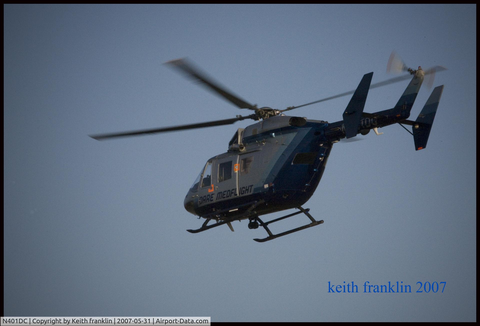 N401DC, 1986 Eurocopter-Kawasaki BK-117A-4 C/N 7101, Helicopter is leaving from helipad at Outer Banks Hospital, Nags head, NC