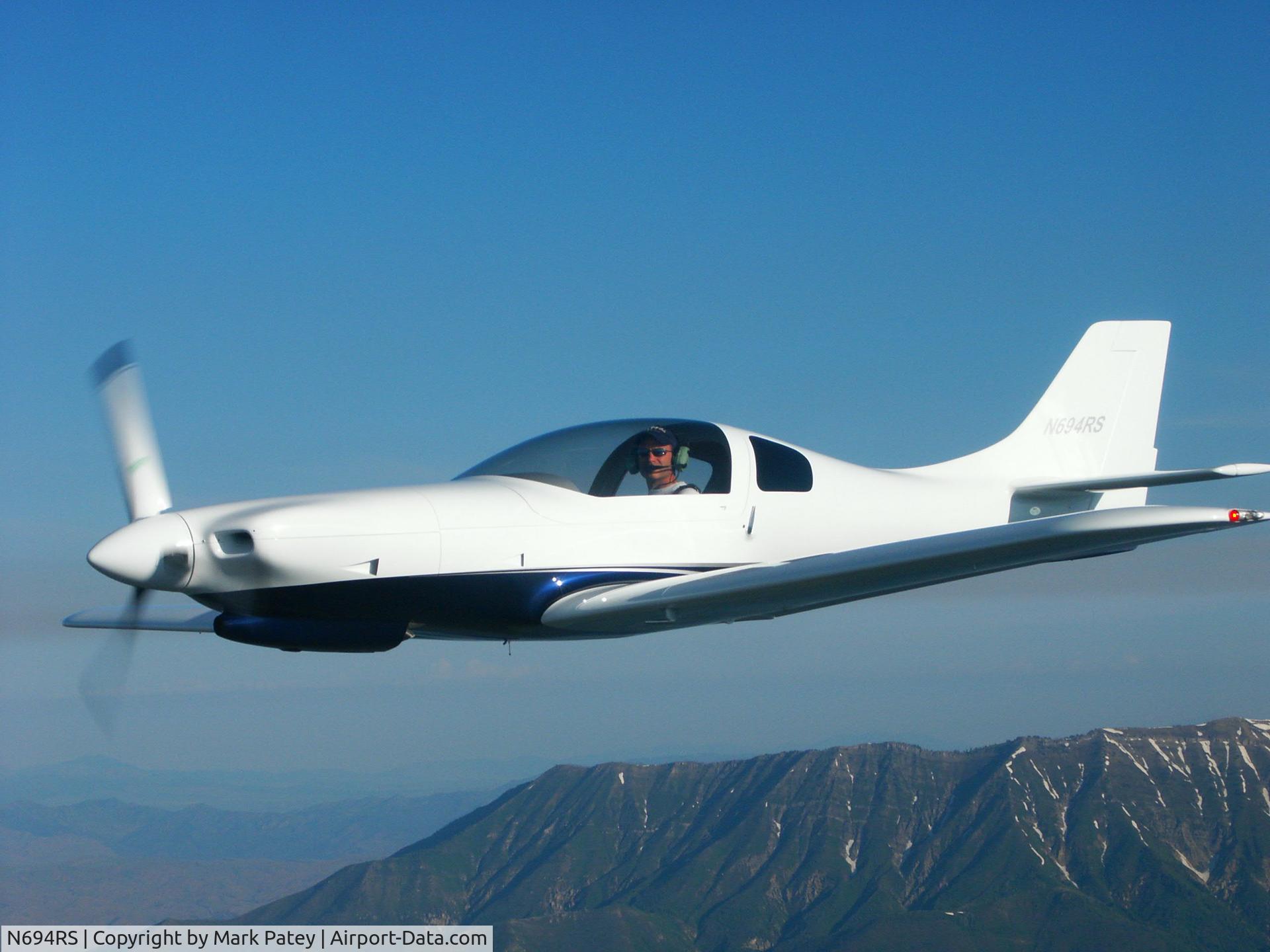 N694RS, 2006 Lancair 235/320 C/N 105, Early Flight over Mount Nebo