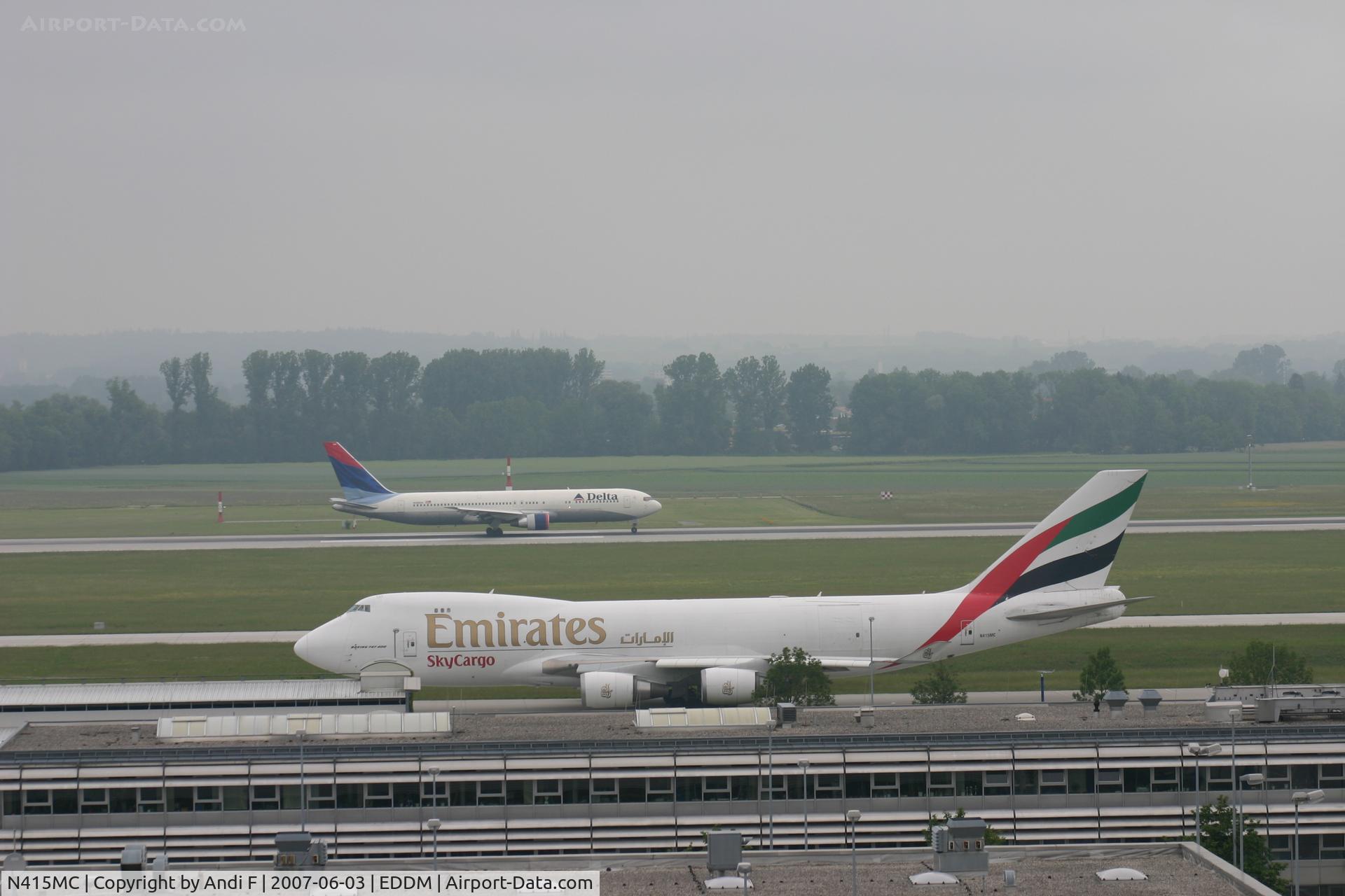 N415MC, 2002 Boeing 747-47UF C/N 32837, Togetter with Delta 767-300