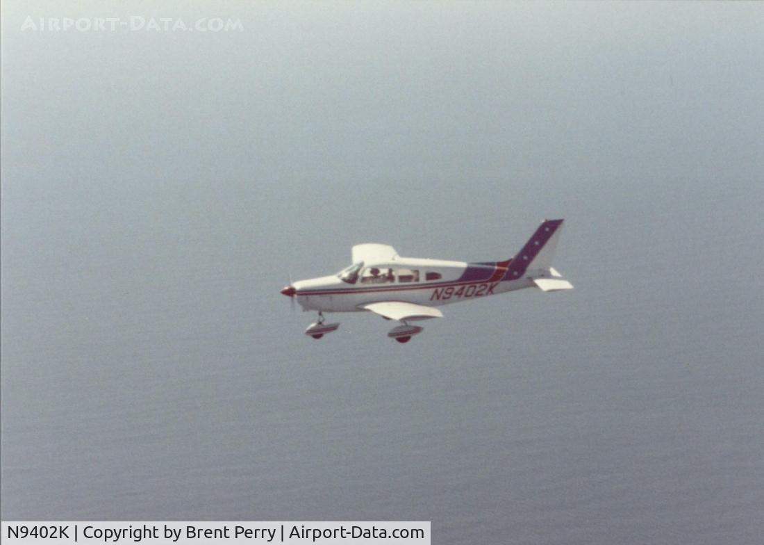 N9402K, 1976 Piper PA-28-151 C/N 28-7615200, Brent Perry in flight somewhere over the east coast
