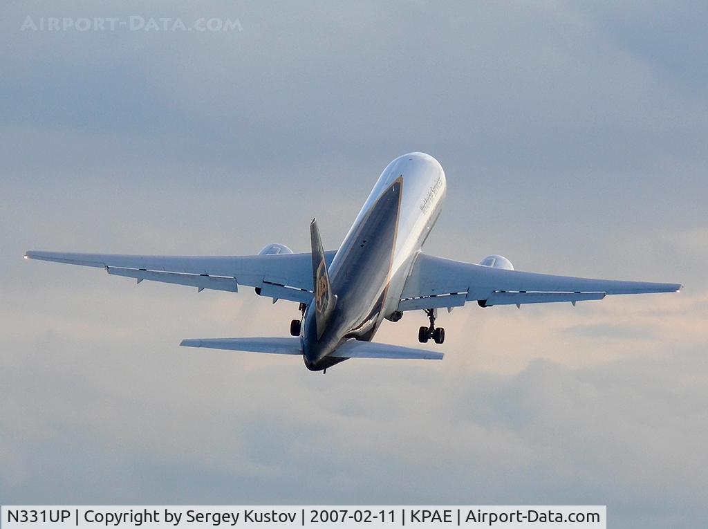 N331UP, 1999 Boeing 767-34AF C/N 27757, Climbing steeply from KPAE
