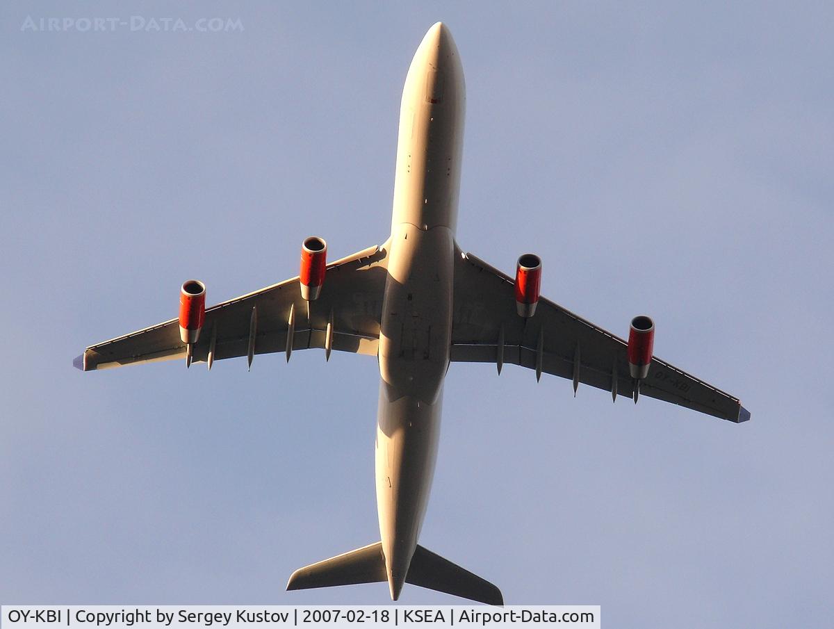 OY-KBI, 2001 Airbus A340-313X C/N 430, On final to Seatac passing University of Washington.