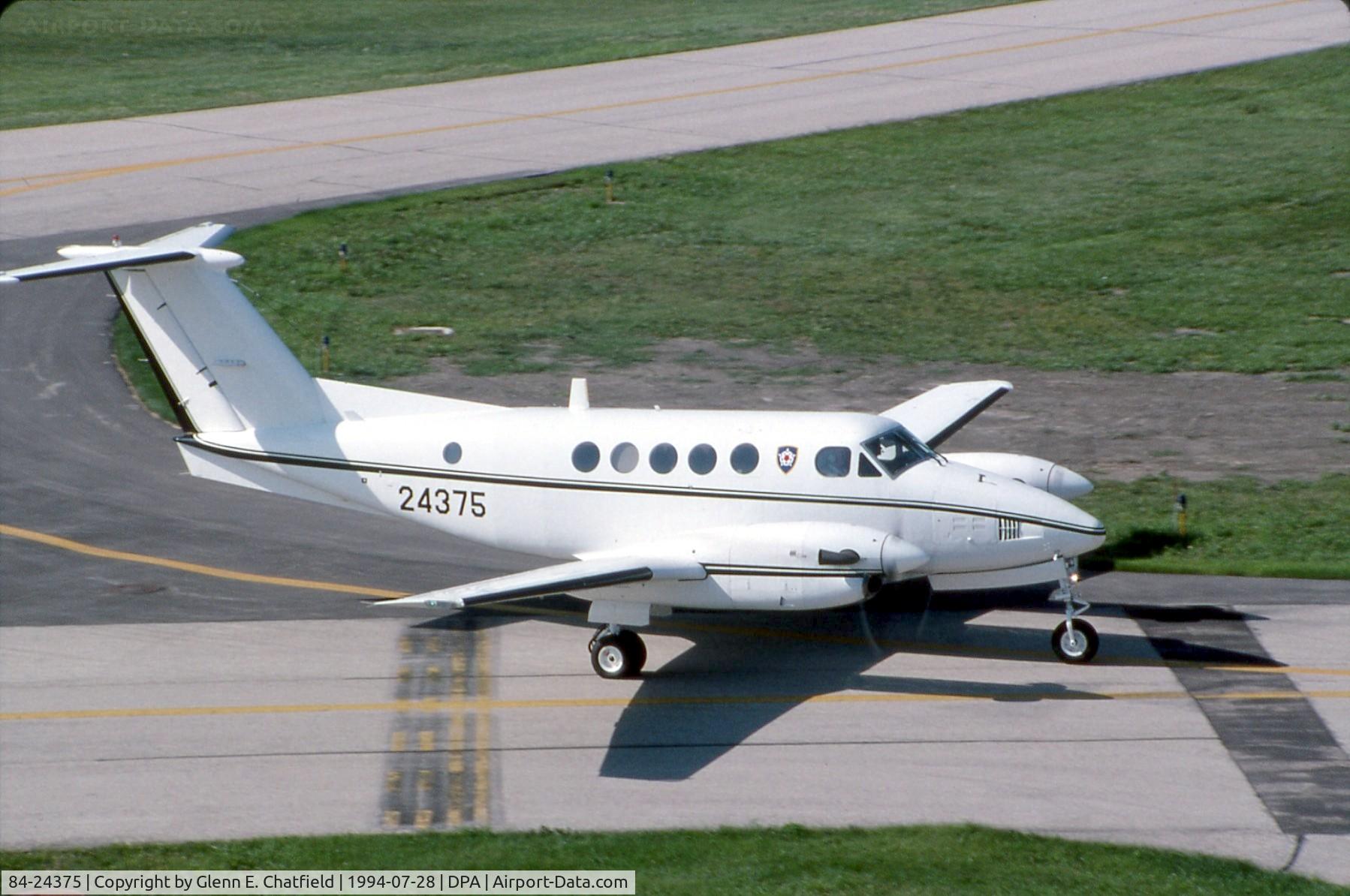 84-24375, 1984 Beech C-12D Huron C/N BP-46, C-12D taxiing past the control tower