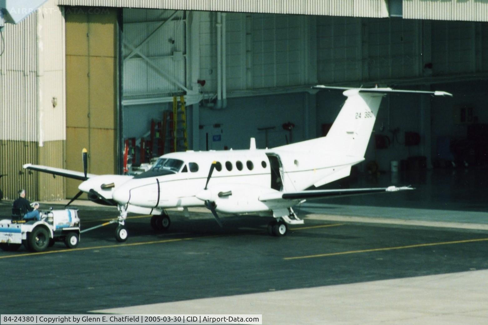 84-24380, 1984 Beech C-12D Huron C/N BP-51, C-12D being towed out of the Rockwell-Collins hangar, seen from the tower with a 600mm lens
