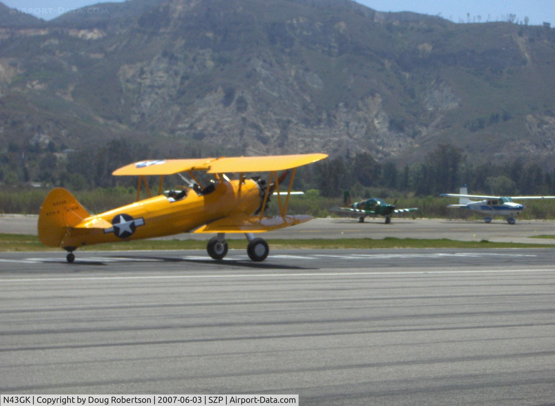 N43GK, 1943 Boeing B75N1 C/N 75-8530, 1943 Boeing Stearman B75N1 as Navy N2S-5, Continental W670 220 Hp, completely restored to absolute original with all stencils and Chrome Yellow paint, landing roll Rwy 22 arriving from Paso Robles
