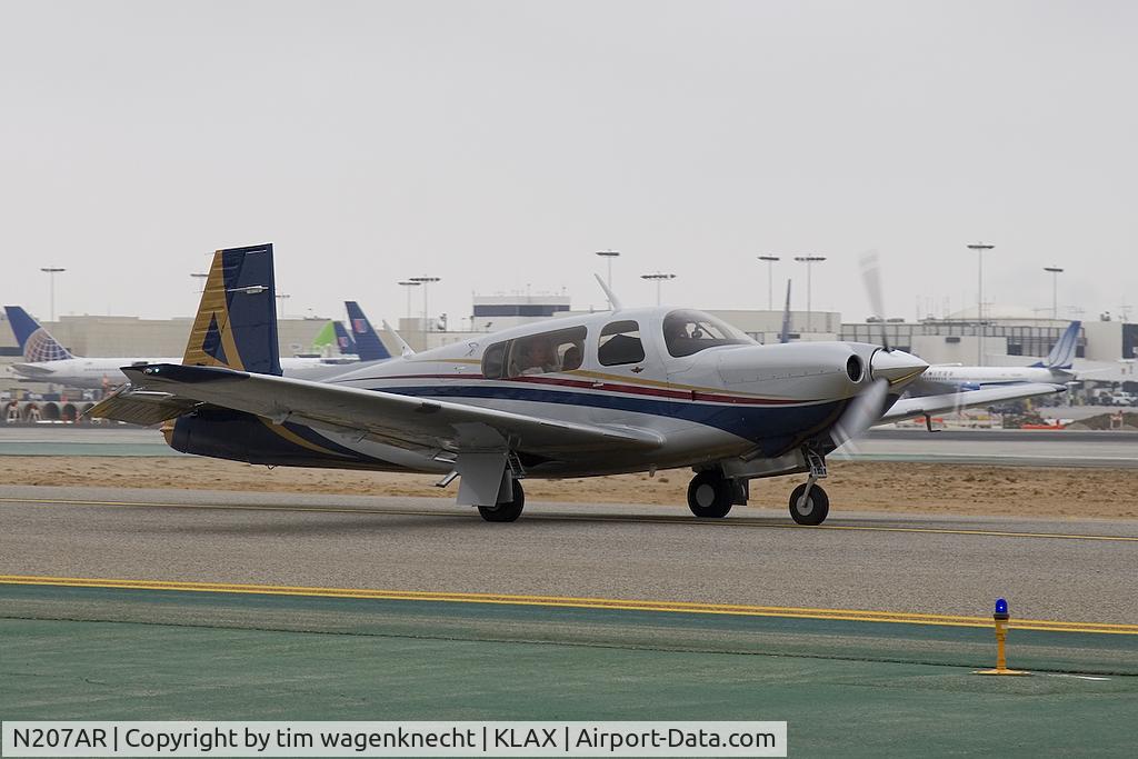 N207AR, 2006 Mooney M20TN Acclaim C/N 31-0012, Caught at KLAX taxing for takeoff