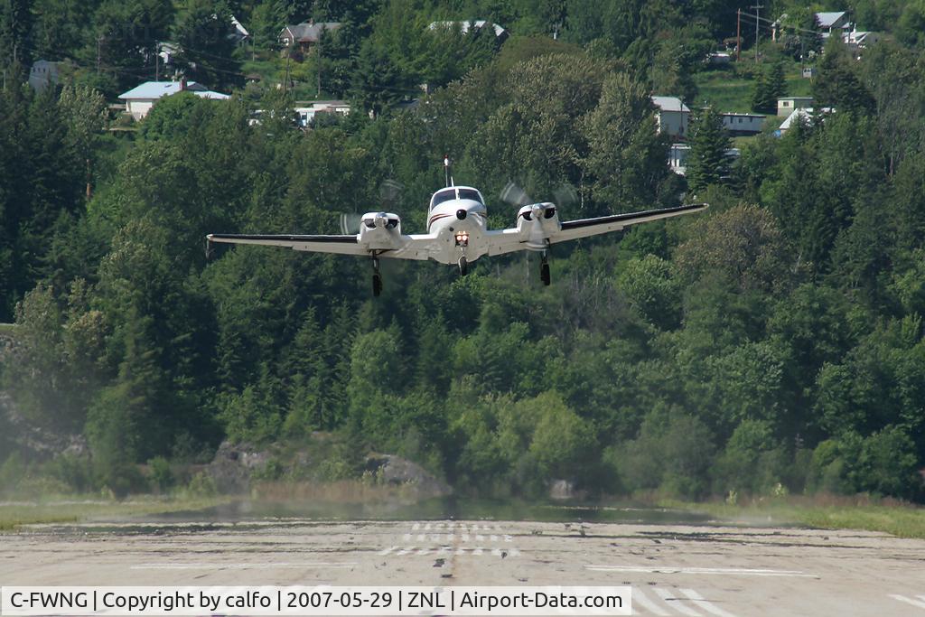 C-FWNG, 1973 Piper PA-31-310 Navajo Navajo C/N 31-7300917, Takeoff on a warm runway