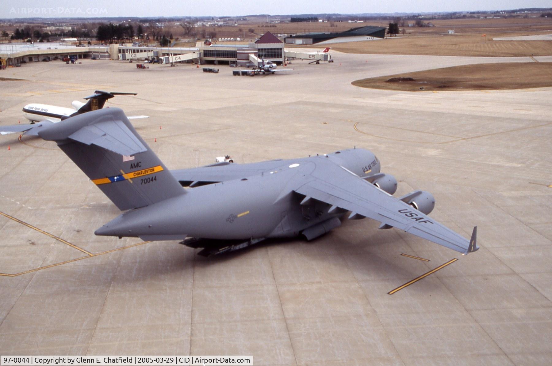 97-0044, 1999 Boeing C-17A Globemaster III C/N P-44, C-17A on cargo ramp below the control tower