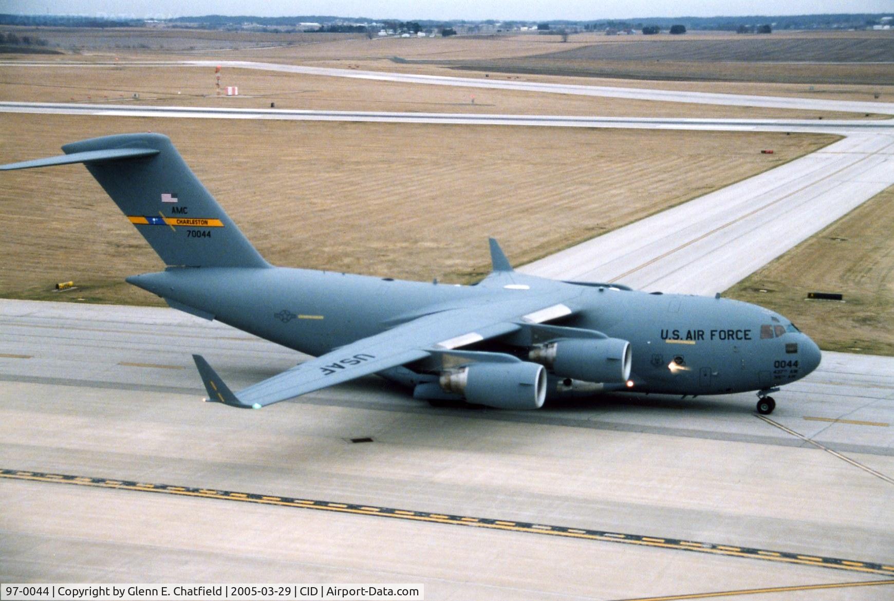 97-0044, 1999 Boeing C-17A Globemaster III C/N P-44, C-17A taxiing past control tower to taxiway D by Rockwell-Collins