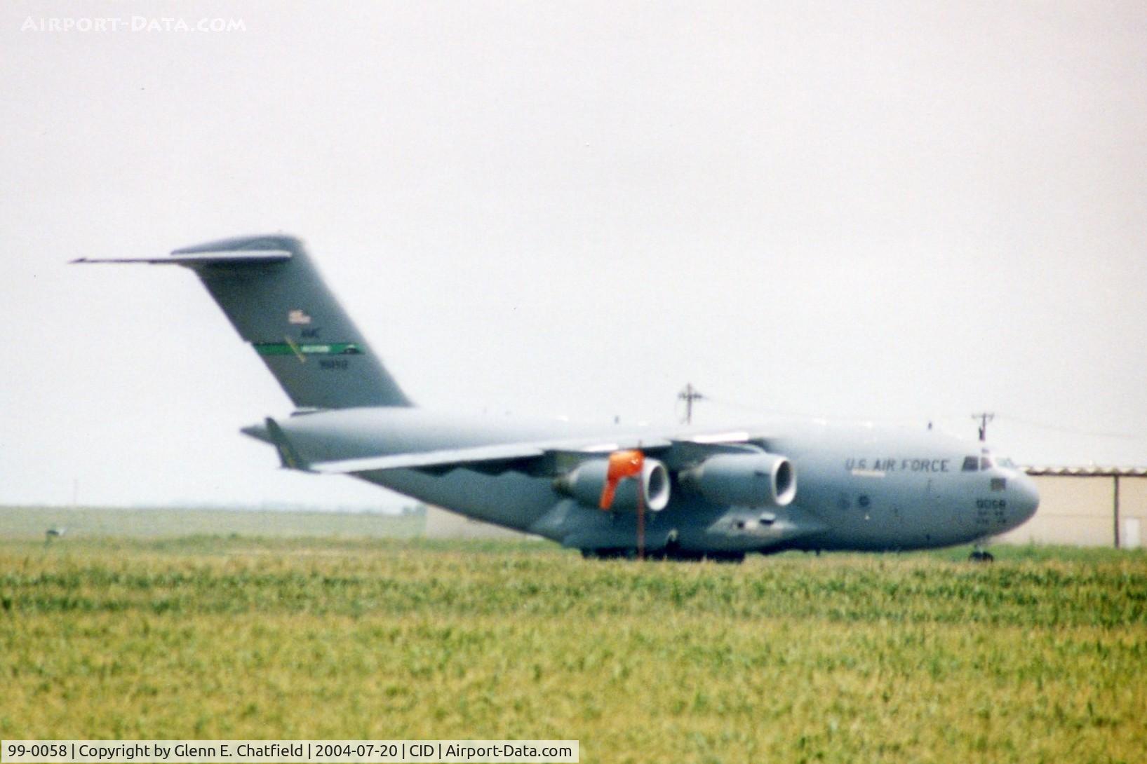 99-0058, 1999 Boeing C-17A Globemaster III C/N 50062/P-58, C-17A parked on taxiway C, 3/4 mile from photographer