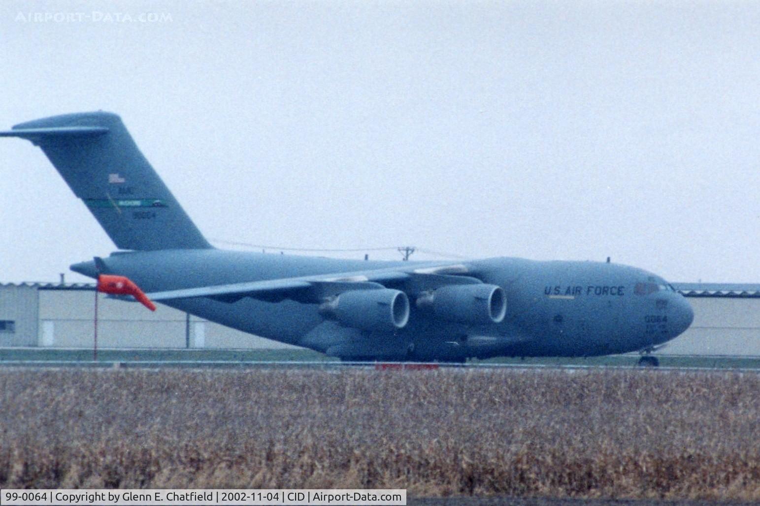 99-0064, 1999 Boeing C-17A Globemaster III C/N 50068/P-64, C-17A parked on taxiway C, 3/4 mile from photographer