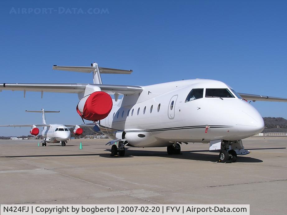 N424FJ, 2001 Fairchild Dornier 328-300 328JET C/N 3185, 424 rests in from of 411.