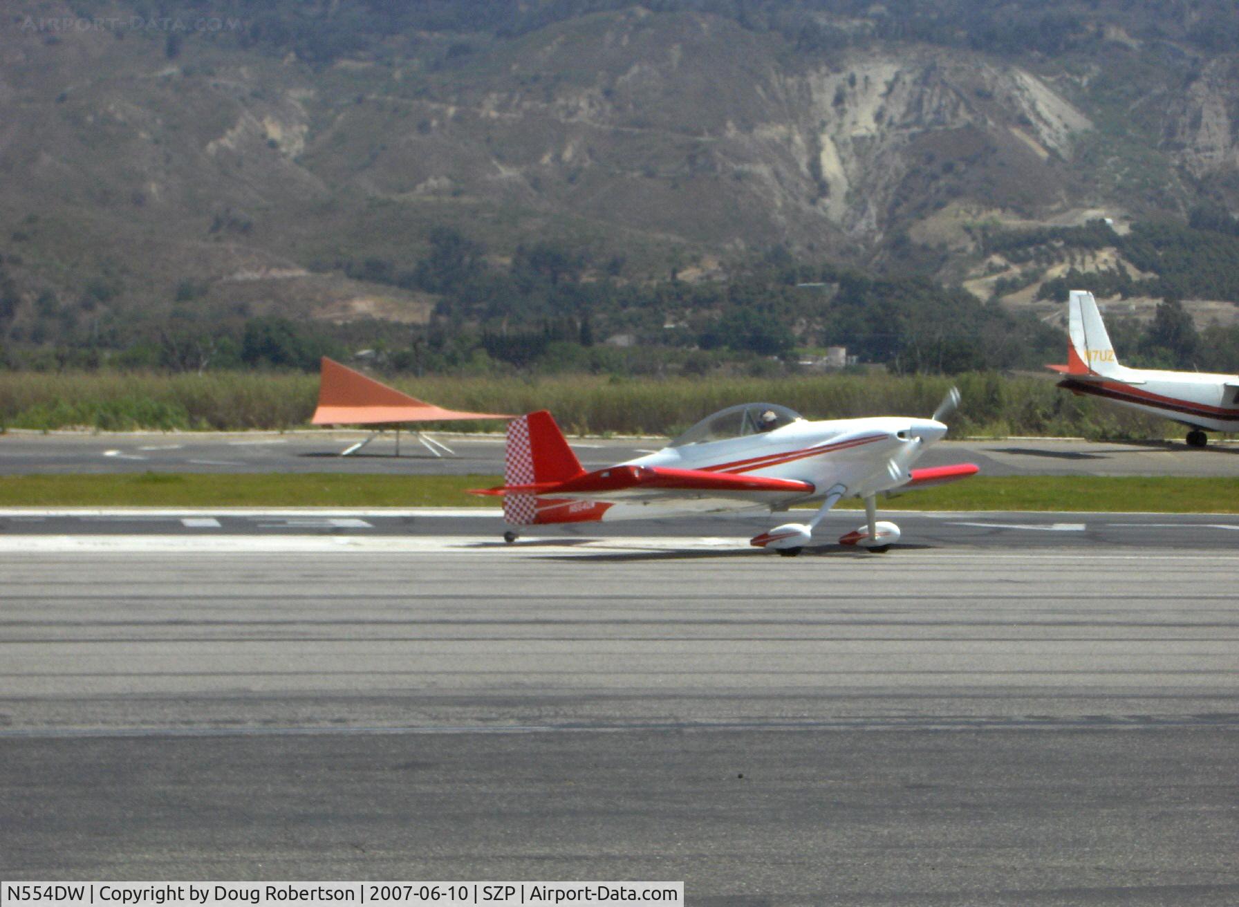 N554DW, 1999 Vans RV-4 C/N 554, 1999 Warne VAN's RV-4, Lycoming O-360-A1D 180 Hp, new checkered rudder, taxi turn off Rwy 22