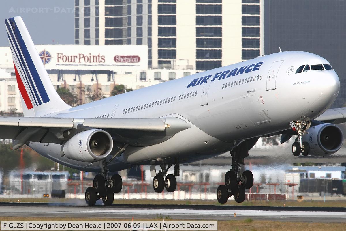F-GLZS, 1999 Airbus A340-313X C/N 310, Air France F-GLZS touching down on RWY 24R.  [Canon 30D + 2X teleconverter + Canon 300mm f/2.8L IS]