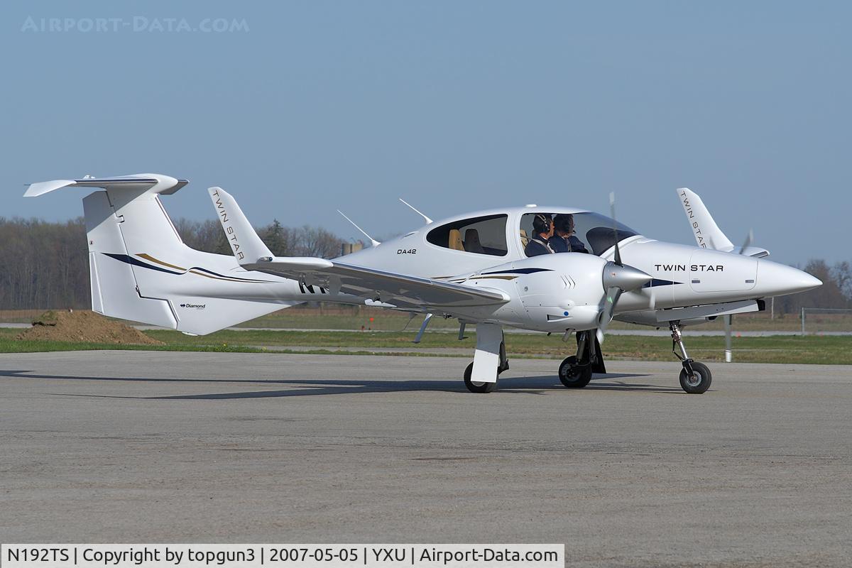 N192TS, Diamond DA-40 Diamond Star C/N 40.971, Taxiing on to Ramp III from Alpha.