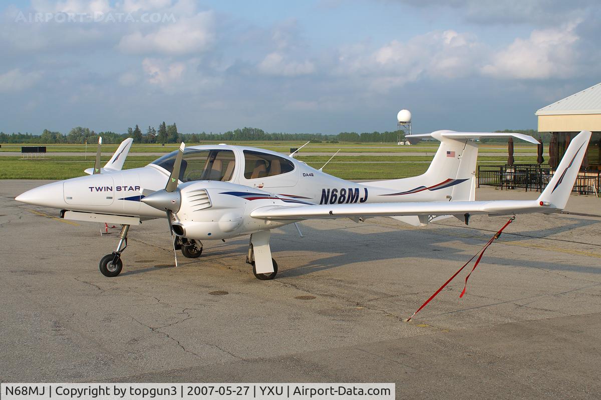 N68MJ, 2007 Diamond DA-42 Twin Star C/N 42.AC063, Parked in front of Katana Kafe.