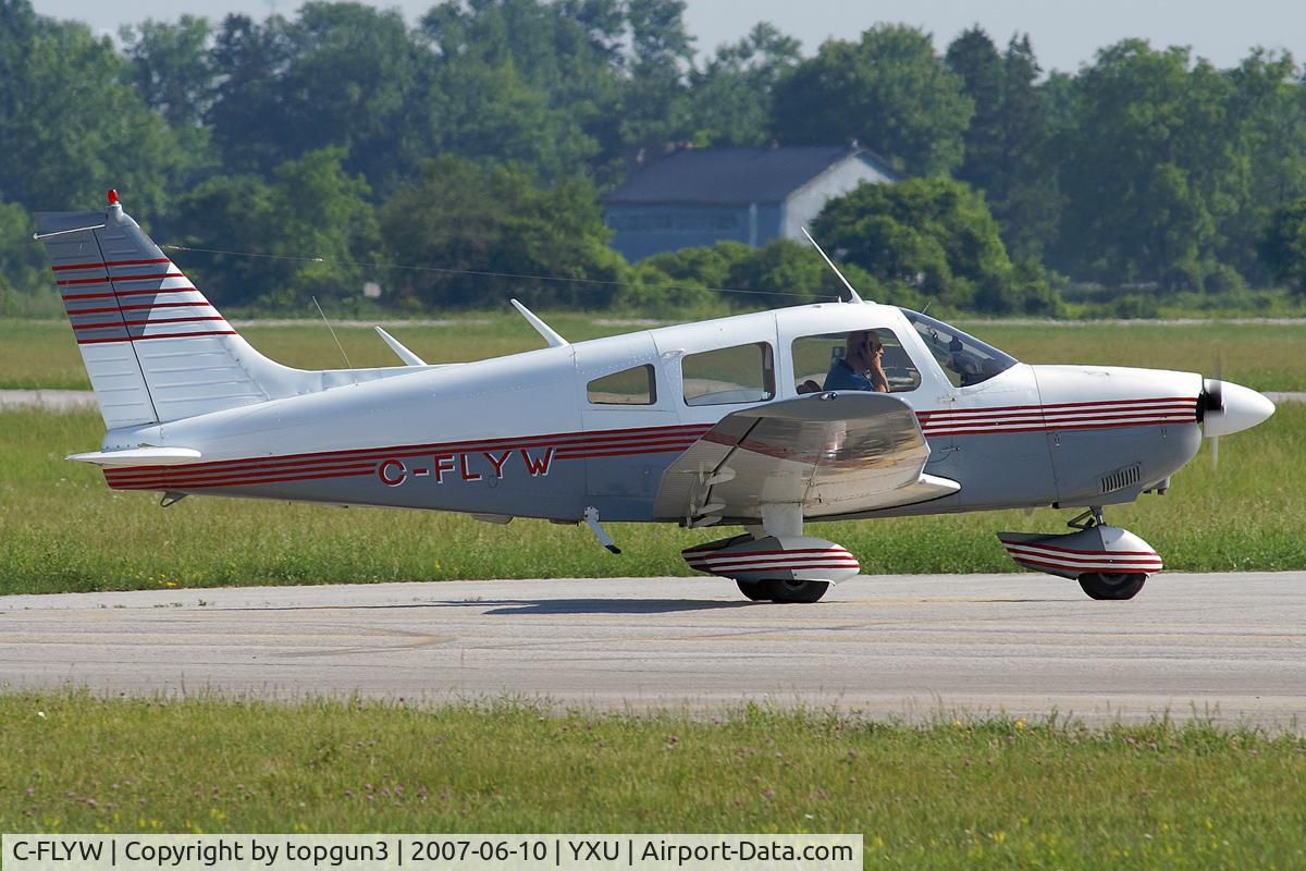 C-FLYW, 1976 Piper PA-28-181 C/N 28-7690435, Taxiing on Golf.