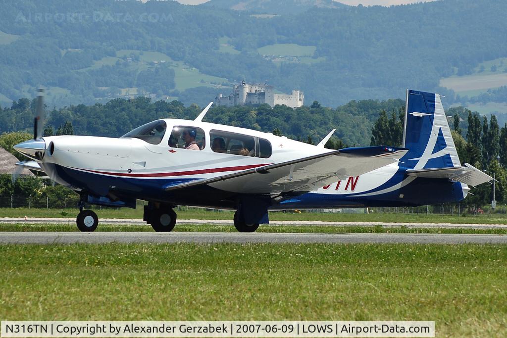 N316TN, 2007 Mooney M20TN Acclaim C/N 31-0013, taxiing in front of the famous castle of Salzburg