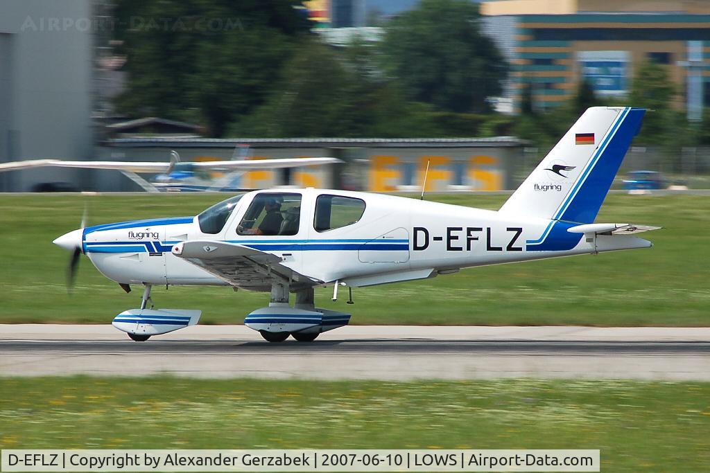 D-EFLZ, 1990 Socata TB-10 Tobago C/N TB1067, panning shot during landing roll