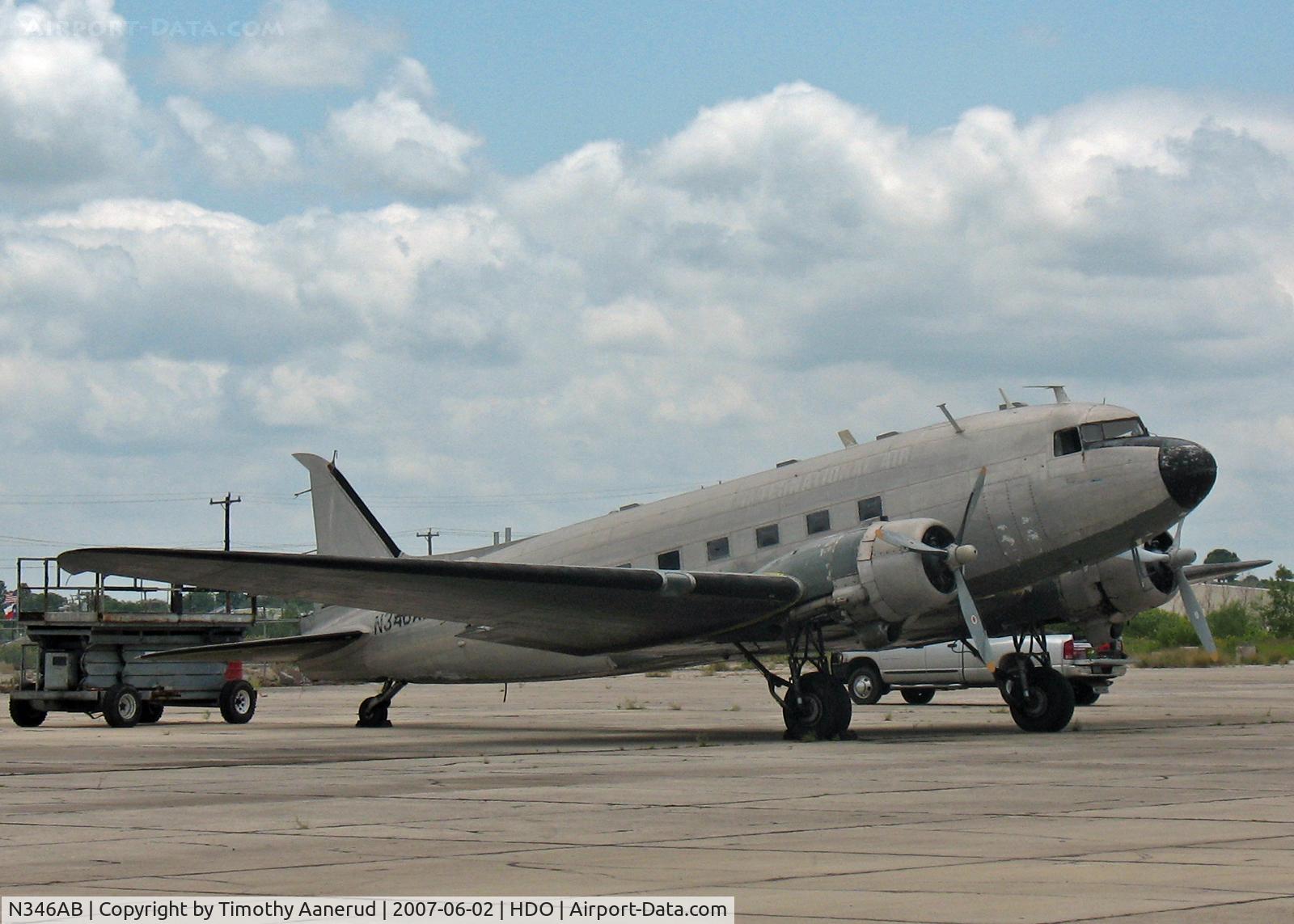 N346AB, 1945 Douglas DC3C-R-1830-90C C/N 16693, Parked at Hondo, TX.  Just after an engine run-up. Ex C-GSCB, Ex C-GGJF, Ex CAF 12905, Ex RAF KP244, Ex 44-77109