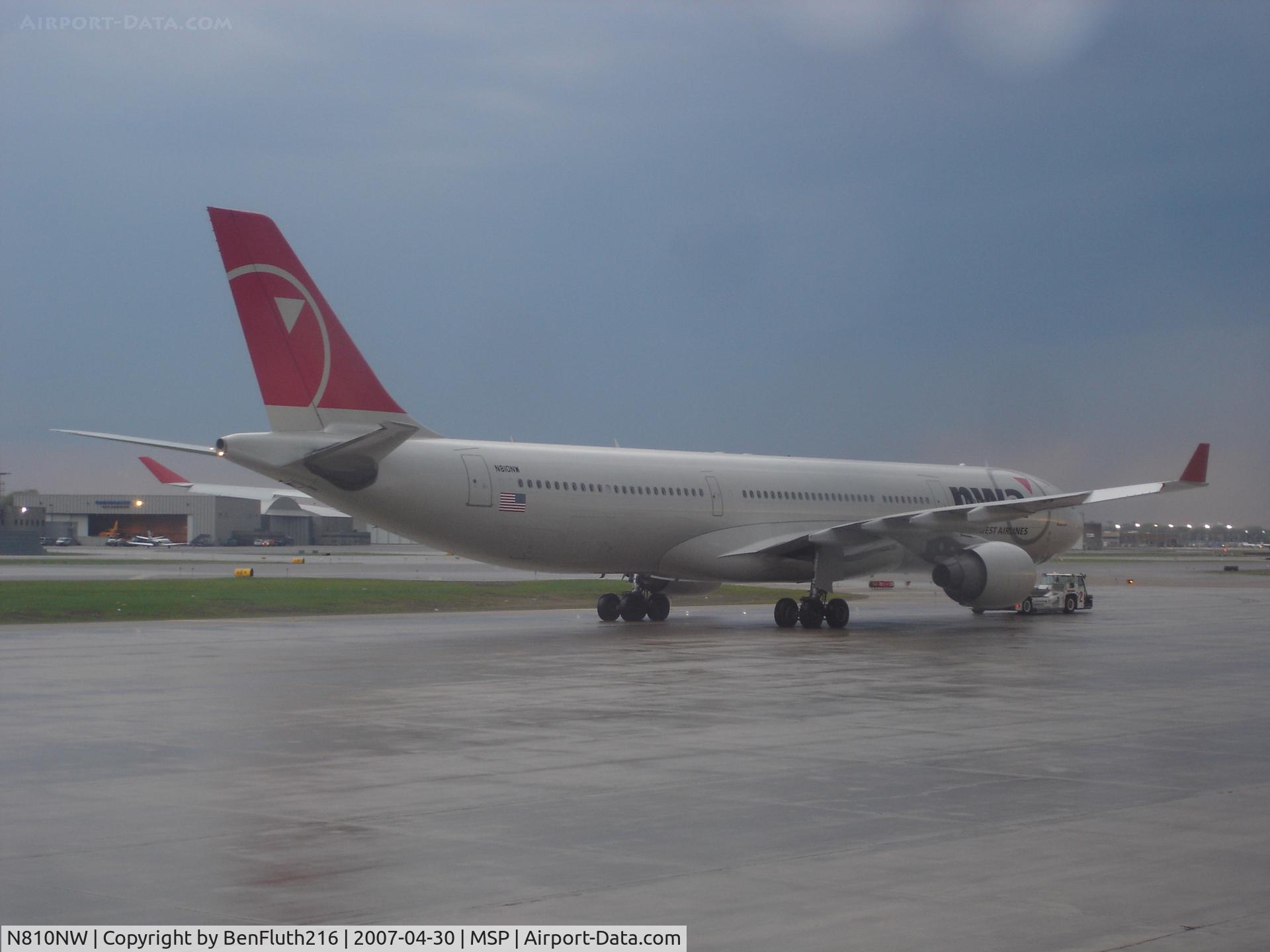 N810NW, 2005 Airbus A330-323 C/N 0674, Being towed to the gate to prepare for a Minneapolis to Amsterdam flight.