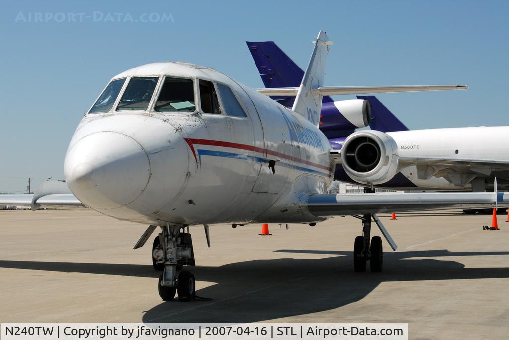 N240TW, 1966 Dassault Falcon (Mystere) 20C C/N 40, Soaking up the sun at Air Cargo Loadmasters.