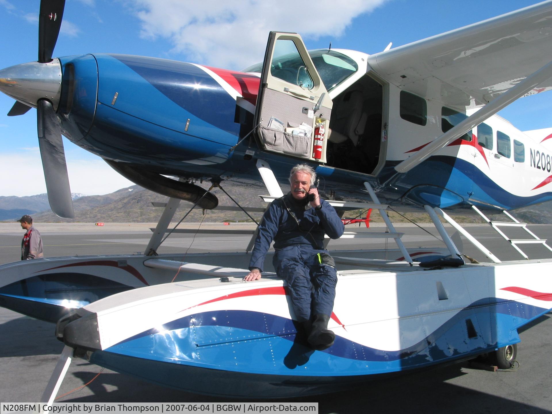 N208FM, 2001 Cessna 208 Caravan I C/N 208-00336, A captain and his ship - N208FM on the ground in Narsarsuaq