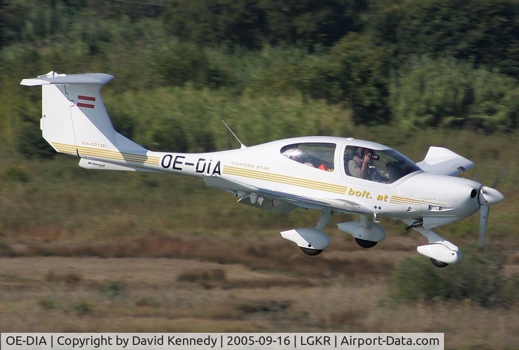 OE-DIA, 2003 Diamond DA-40D Diamond Star C/N D4.072, The Guy in the right seat getting his approach photo of Corfu.