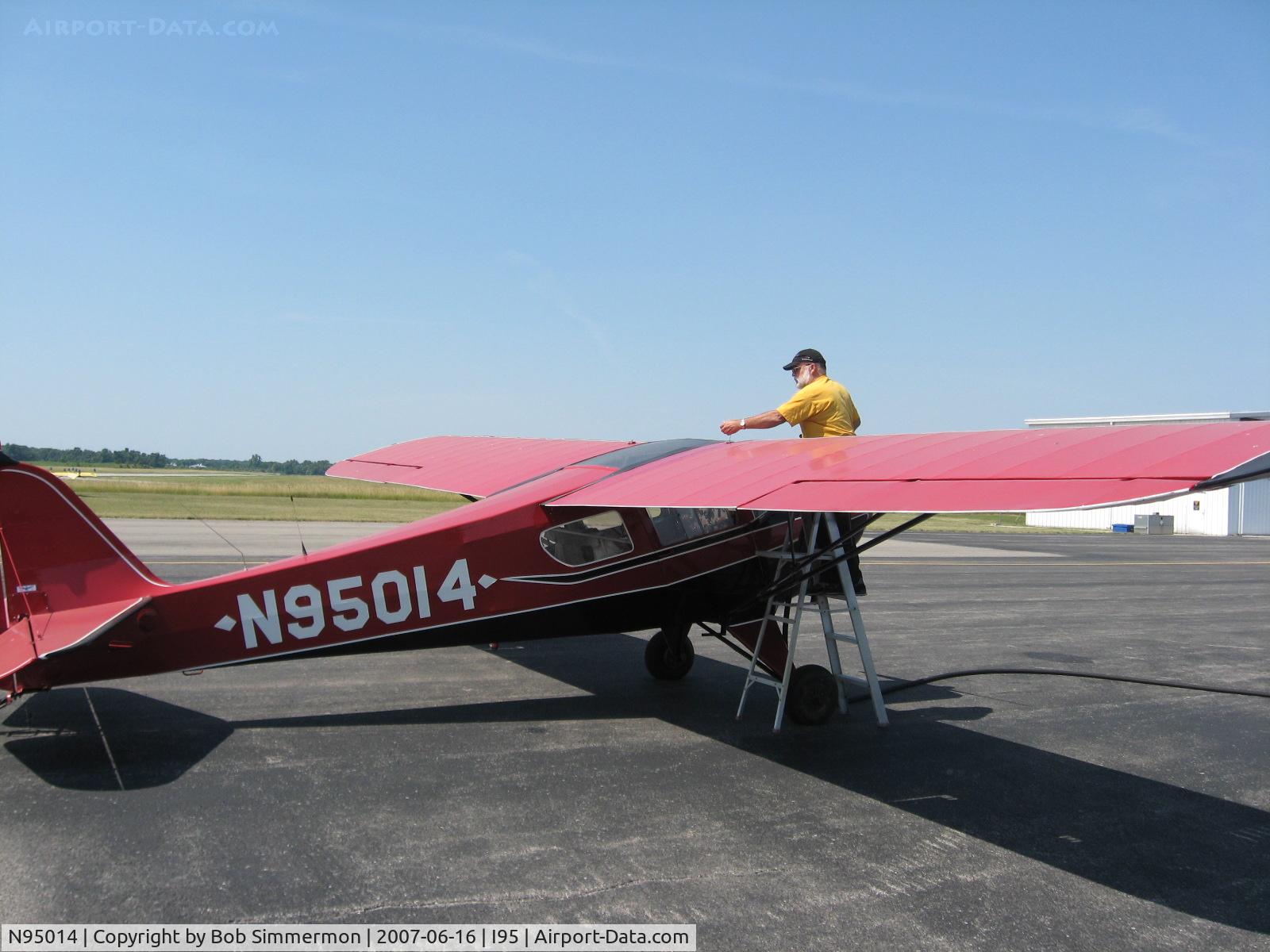 N95014, 1946 Taylorcraft BC12-D C/N 9414, Sam gassing up his business coupe at Kenton, OH.