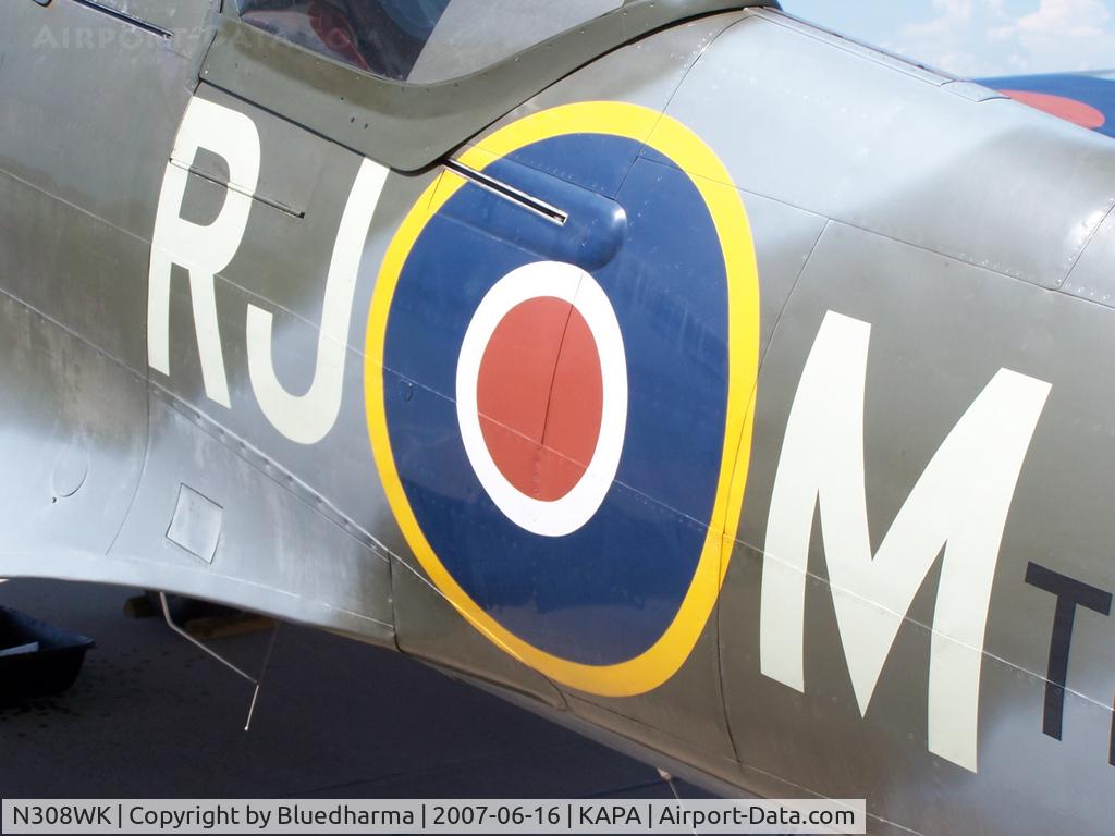 N308WK, 1945 Supermarine 361 Spitfire Tr9 C/N CBAF.4494, Side Logo