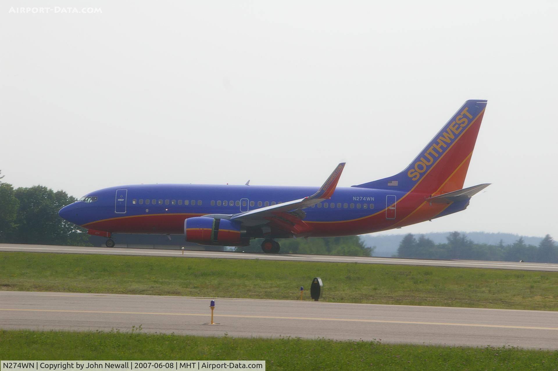 N274WN, 2007 Boeing 737-7H4 C/N 32529, rolling to a stop on runway 17