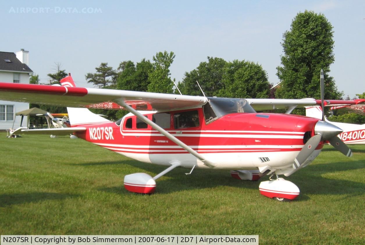 N207SR, 1980 Cessna T207A C/N 20700623, Father's Day fly-in at Beach City, OH.  I did not skew this photograph - that's one long Cessna!