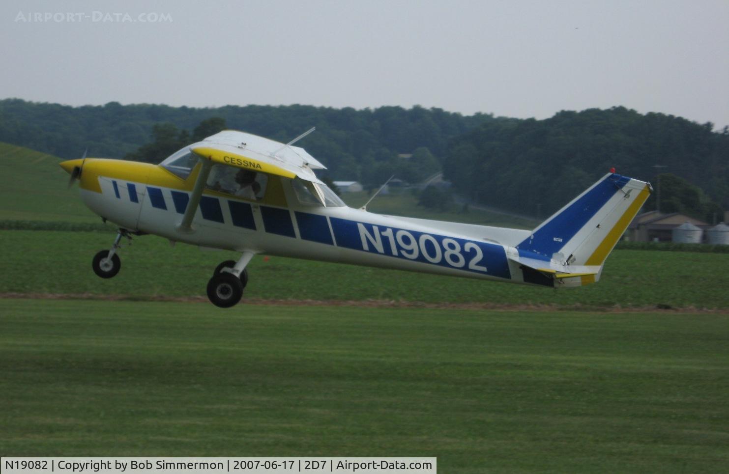 N19082, 1972 Cessna 150L C/N 15074153, A little high, otherwise text book full stall landing, which often results in grass stains on the tail eye-bolt.  Father's Day fly-in at Beach City, OH