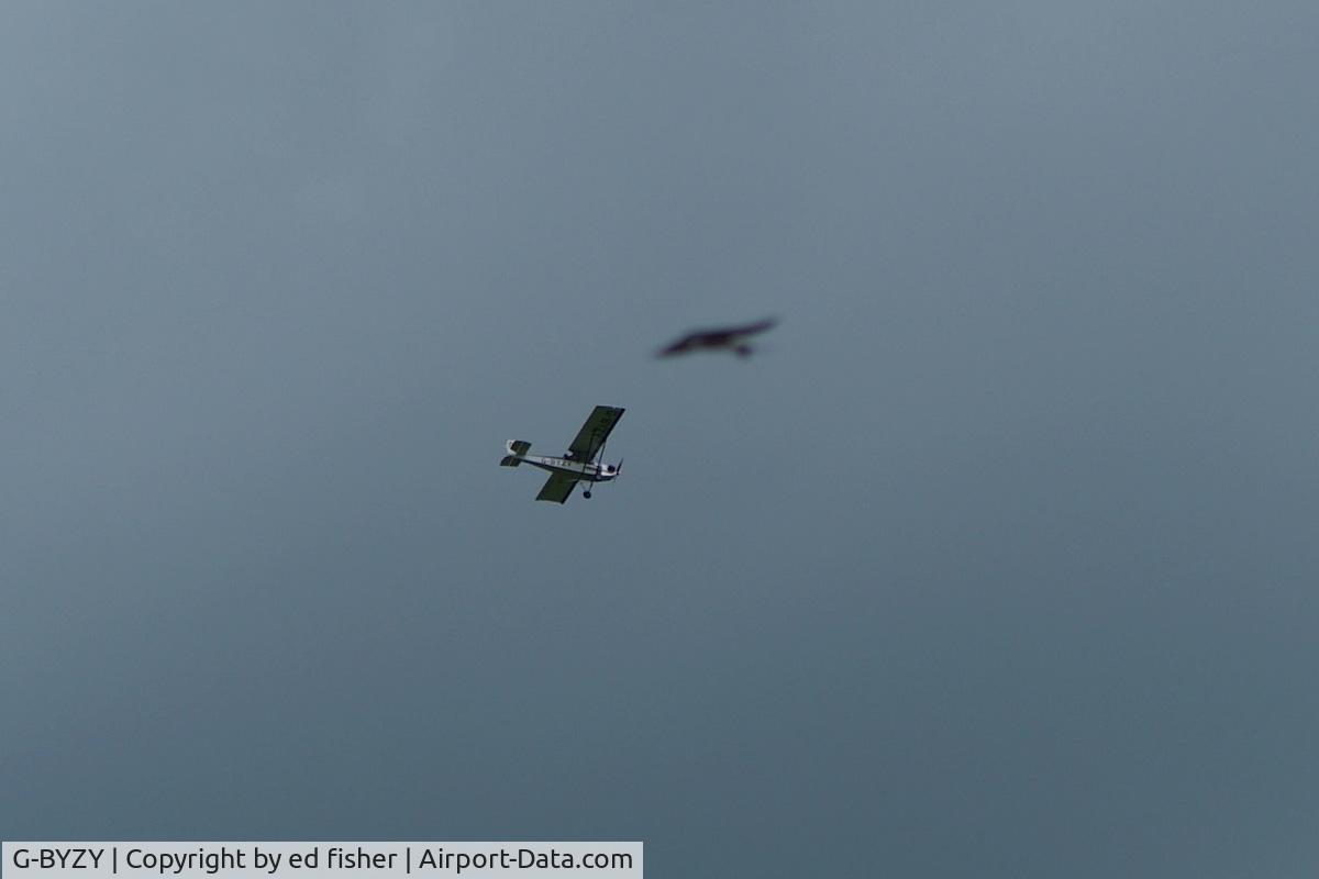 G-BYZY, 2000 Pietenpol Air Camper C/N PFA 047-12190, close up of near miss with ufo (or ghost inverted spitfire???)