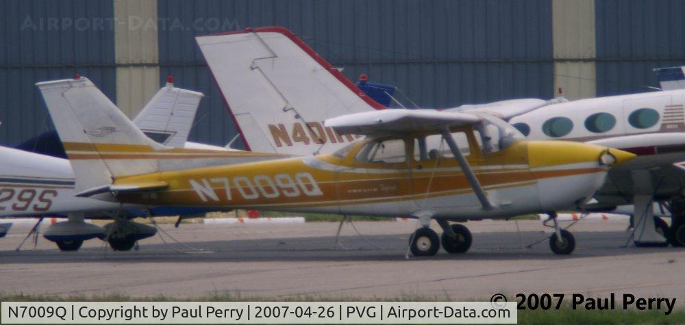 N7009Q, 1971 Cessna 172L C/N 17260309, Spotted this canary-like standout despite the rain
