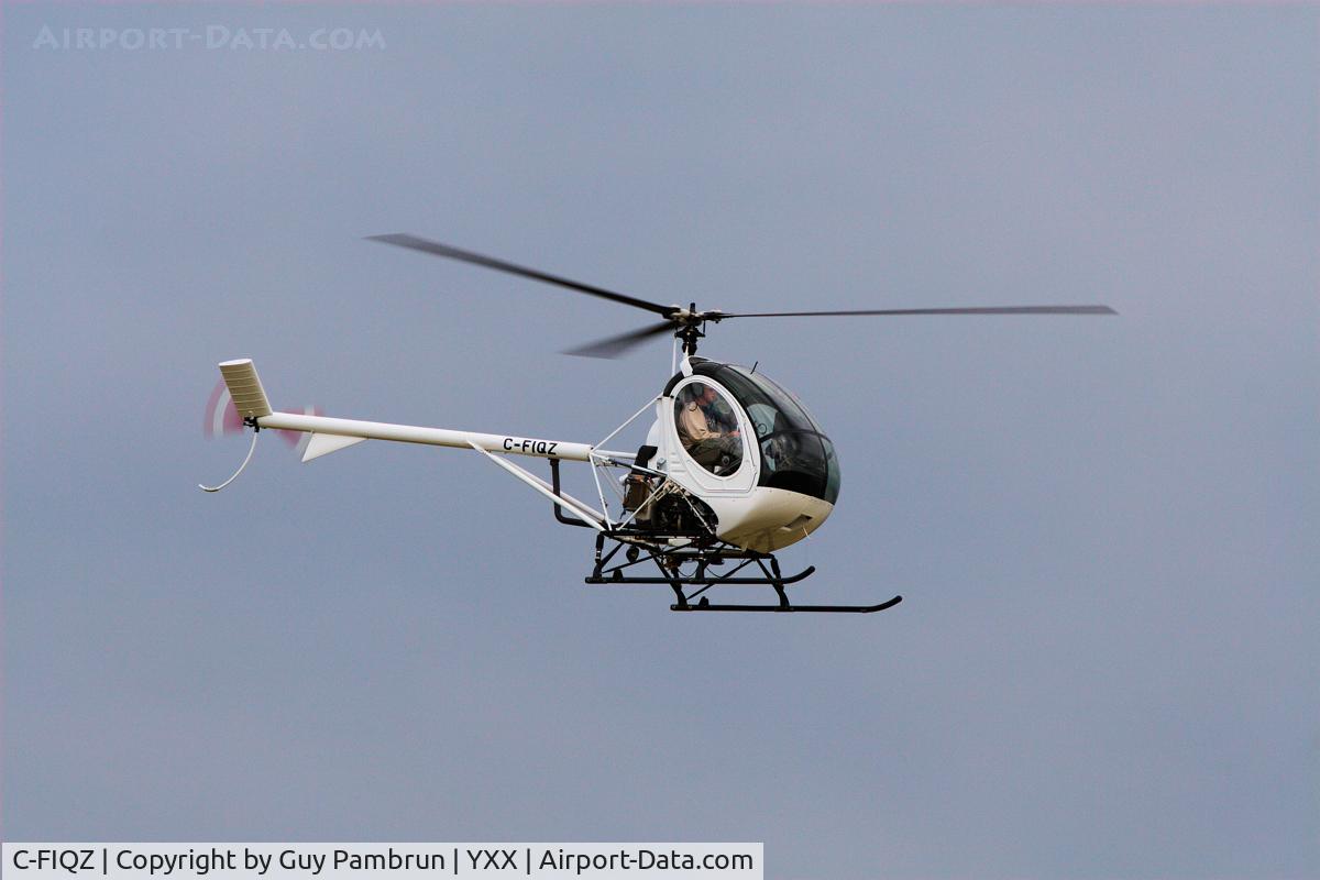C-FIQZ, 2006 Schweizer 269C-1 C/N 0249, Coming in to roost from flight training