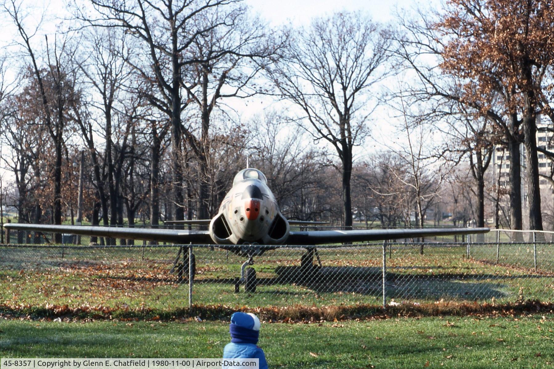 45-8357, 1945 Lockheed F-80C-11-LO Shooting Star C/N 080-1571, At Phillips Park in Aurora, IL.  Later replaced by an F-105.  That's my daughter again.