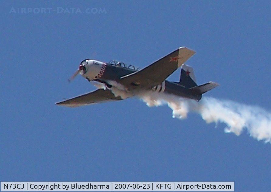 N73CJ, 1973 Nanchang CJ-6A C/N 2951231, In Flight with smoke