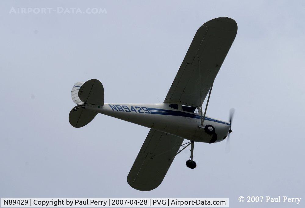 N89429, 1946 Cessna 140 C/N 8461, Making her way into a foreboding sky
